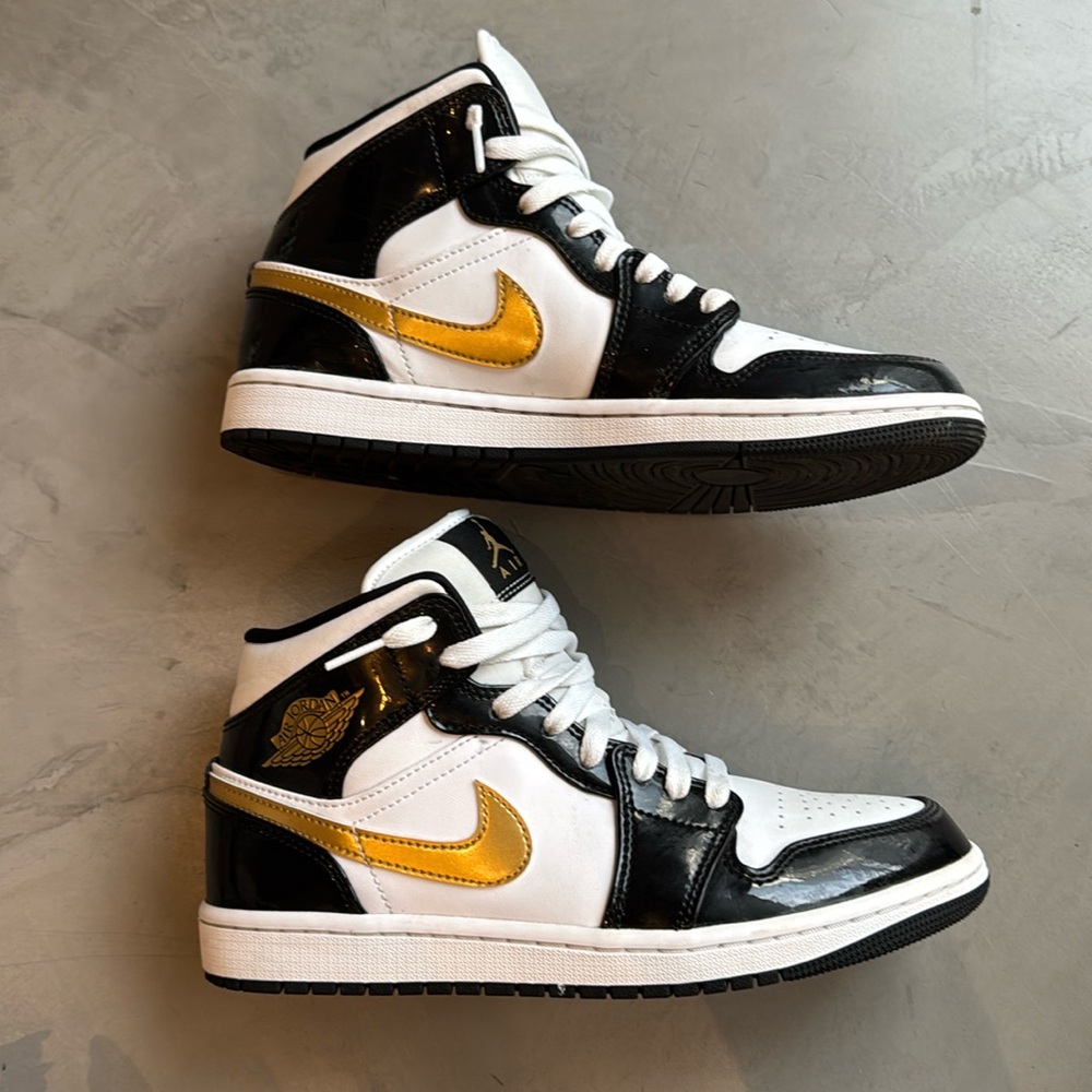 Air Jordan black/gold patent Mid SE